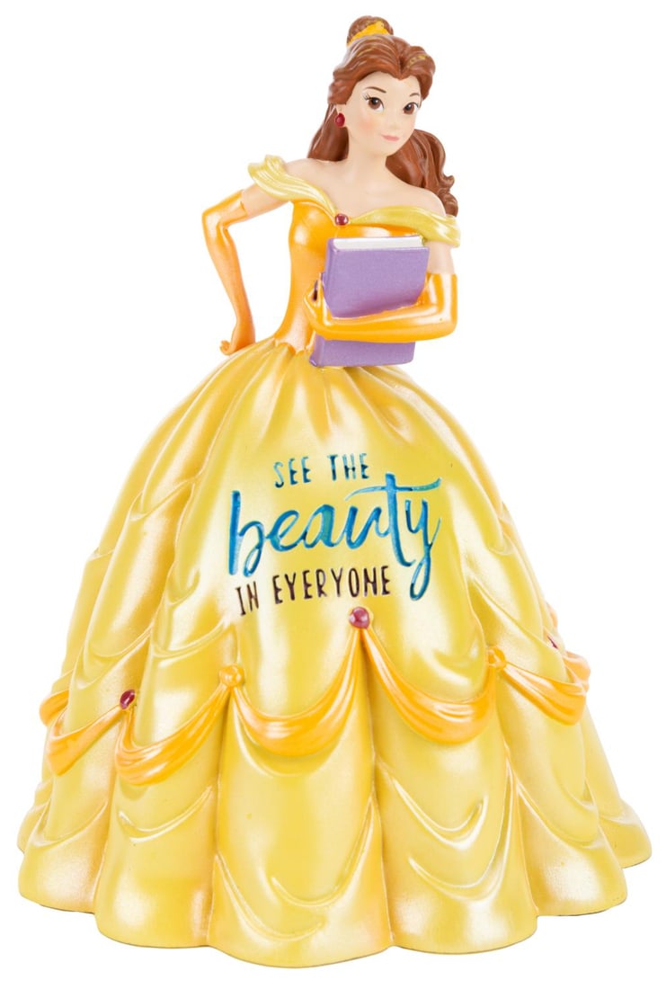 A Disney Princess Expression Belle Figurine.: (Enesco, 2022) A Disney Princess Expression series figurine of Belle from Disney's "Beauty and the Beast." The resin figurine features an inscription that reads "See the beauty in everyone" and was