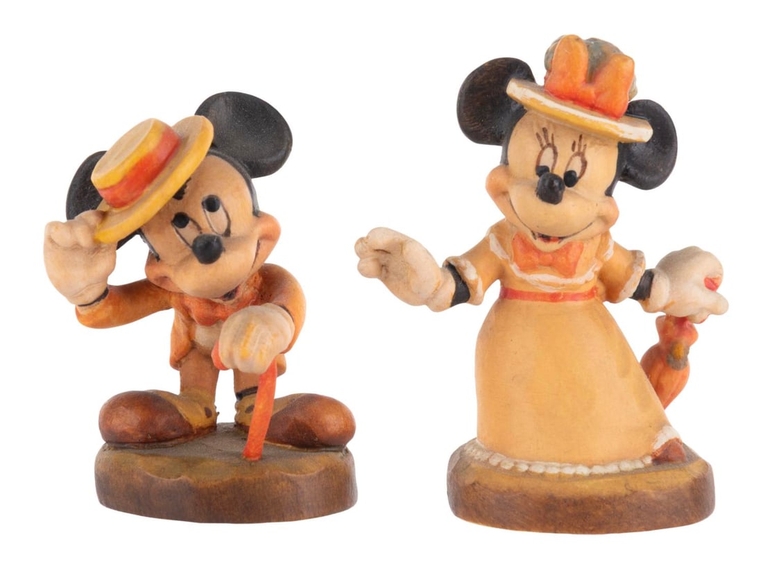 A Pair of Mickey and Minnie Mouse Figurines. (1 of 4)