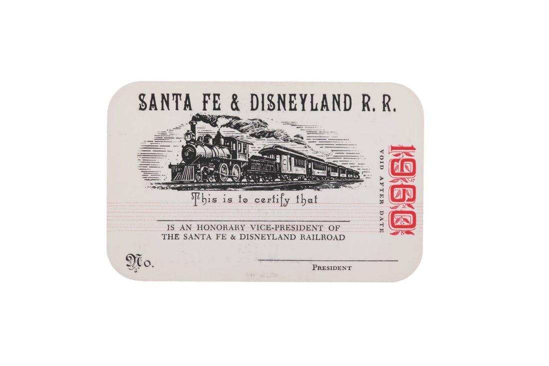 A Santa Fe & Disneyland R. R. Honorary Vice-President Card.: (Disneyland, 1960) An exceptionally rare unused Santa Fe & Disneyland Railroad Honorary Vice President Card. Measuring 2.3" x 3.75" the card is in very good condition with light ink transfer from