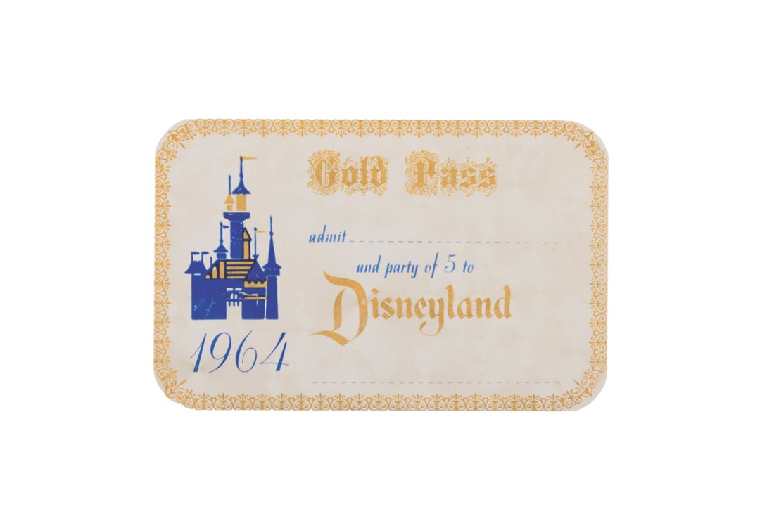 A 1964 Disneyland Gold Main Gate Admission Pass.: (Disneyland, 1964) An original Disneyland Gold Main Gate Admission Gold Pass from 1964. This unused Pass was valid for an entire year, was issued to Walt Disney Productions Employees, VIPs, and Specia
