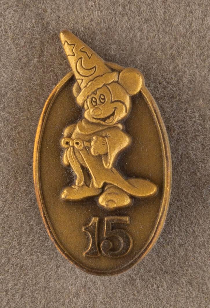 A Disneyland Cast Member 15 Year Service Pin. (1 of 2)