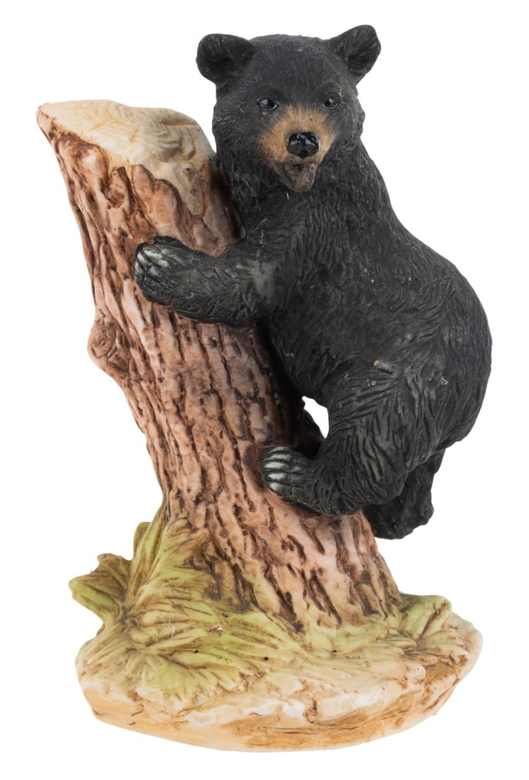 A Disneyland Souvenir Bear Figurine. (1 of 4)