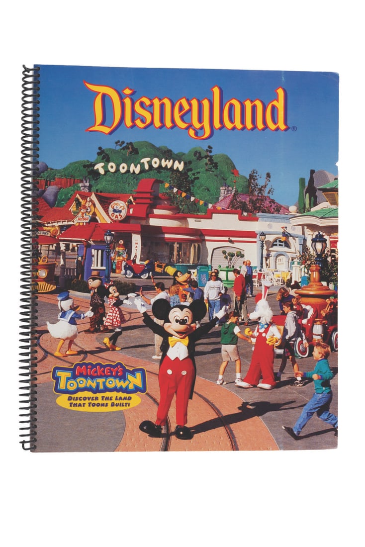 A Disneyland History of the Walt Disney Company Book.: (Disneyland, 1993) A rare amended copy of The History of the Walt Disney Company Cast Member publication featuring a Mickey's Toontown cover. Measuring 9.5" x 11.5", this spiral-bound book displays in