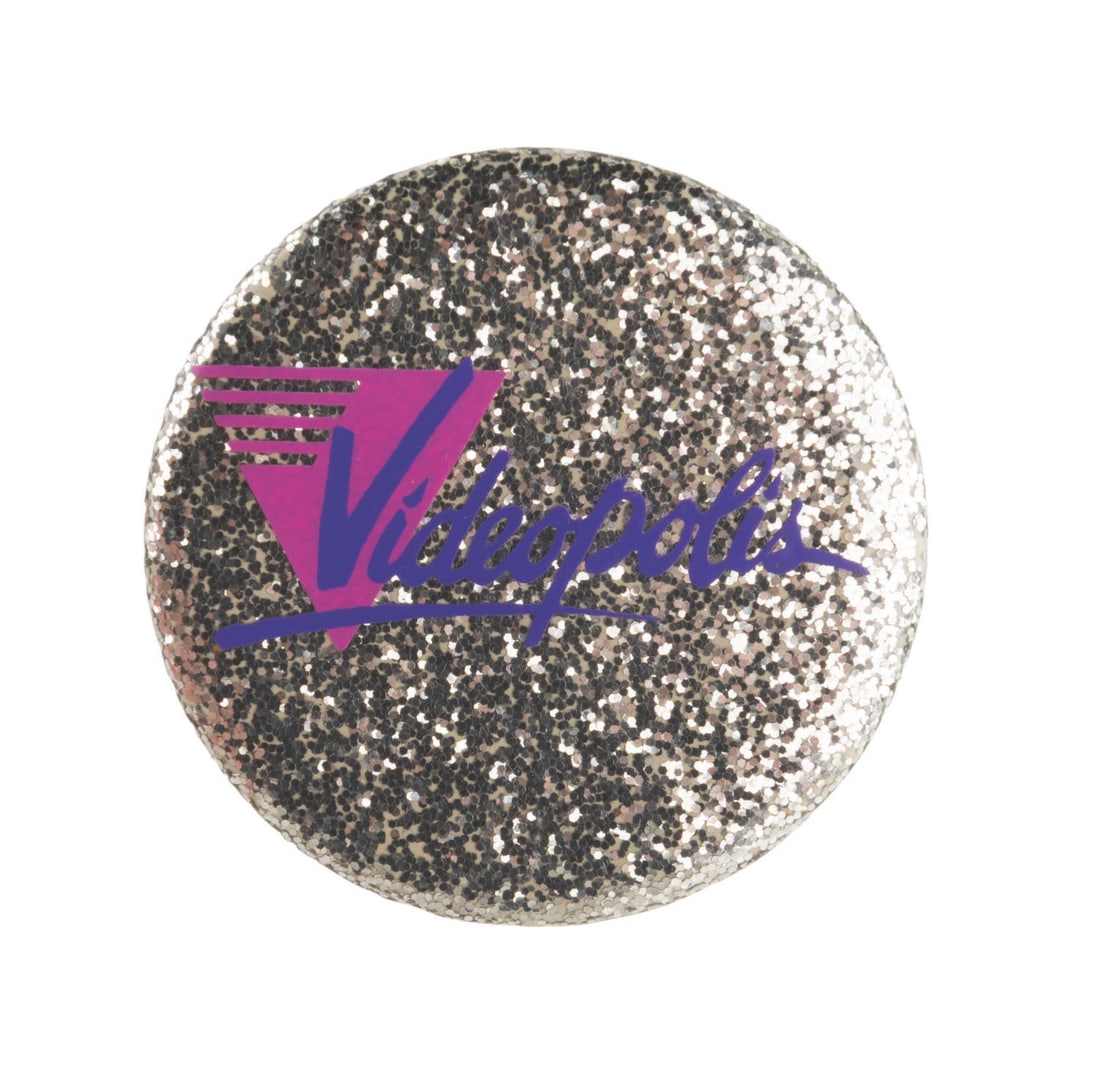 A Disneyland Videopolis Button. - 2