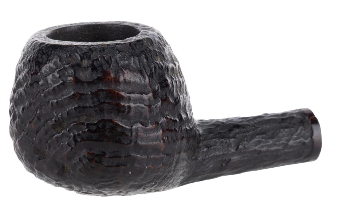 A Walt Disney World Tobacco Pipe Bowl. (1 of 5)