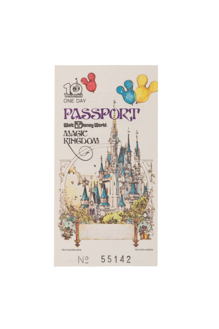 A Rare Walt Disney World Magic Kingdom Tencennial Passport. (1 of 2)