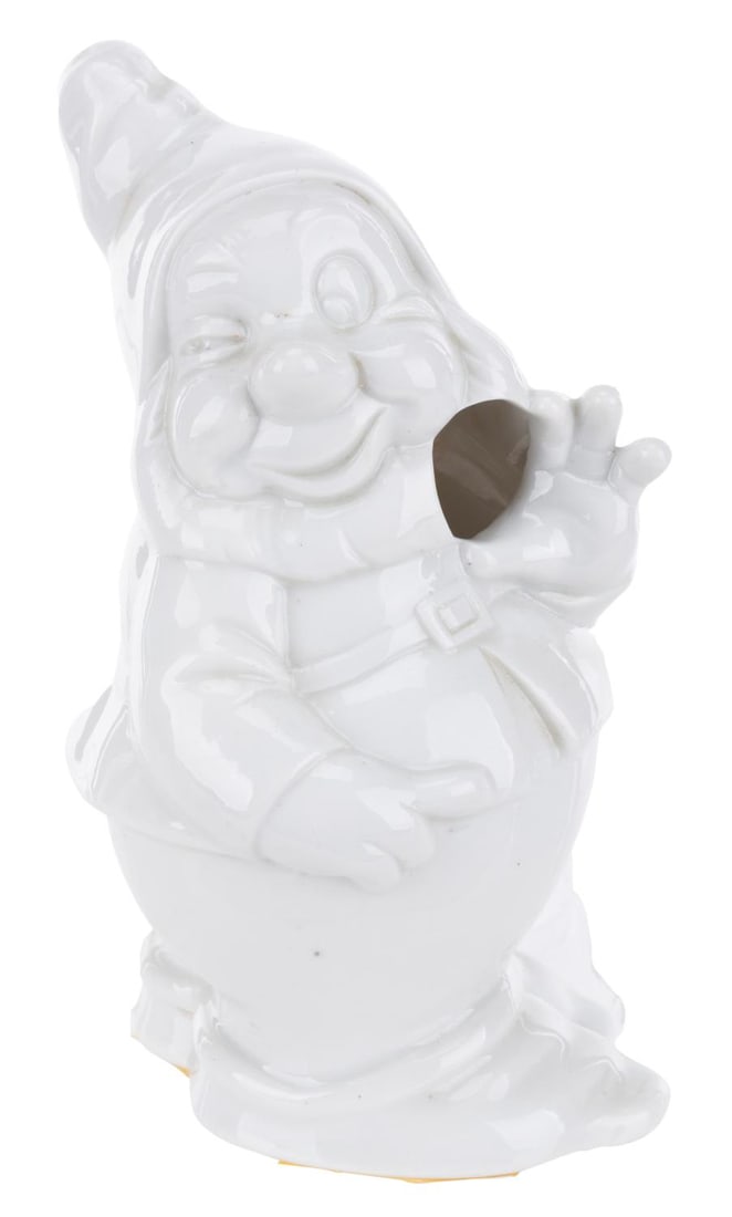 A Toky Disneyland Happy Figurine.: (Tokyo Disneyland, 1980s-90s) A rare porcelain Happy cotton ball dispenser, originally sold at Tokyo Disneyland. Measuring 3.25" x 3.25" x 5.25" tall, the porcelain figurine is in very good condition