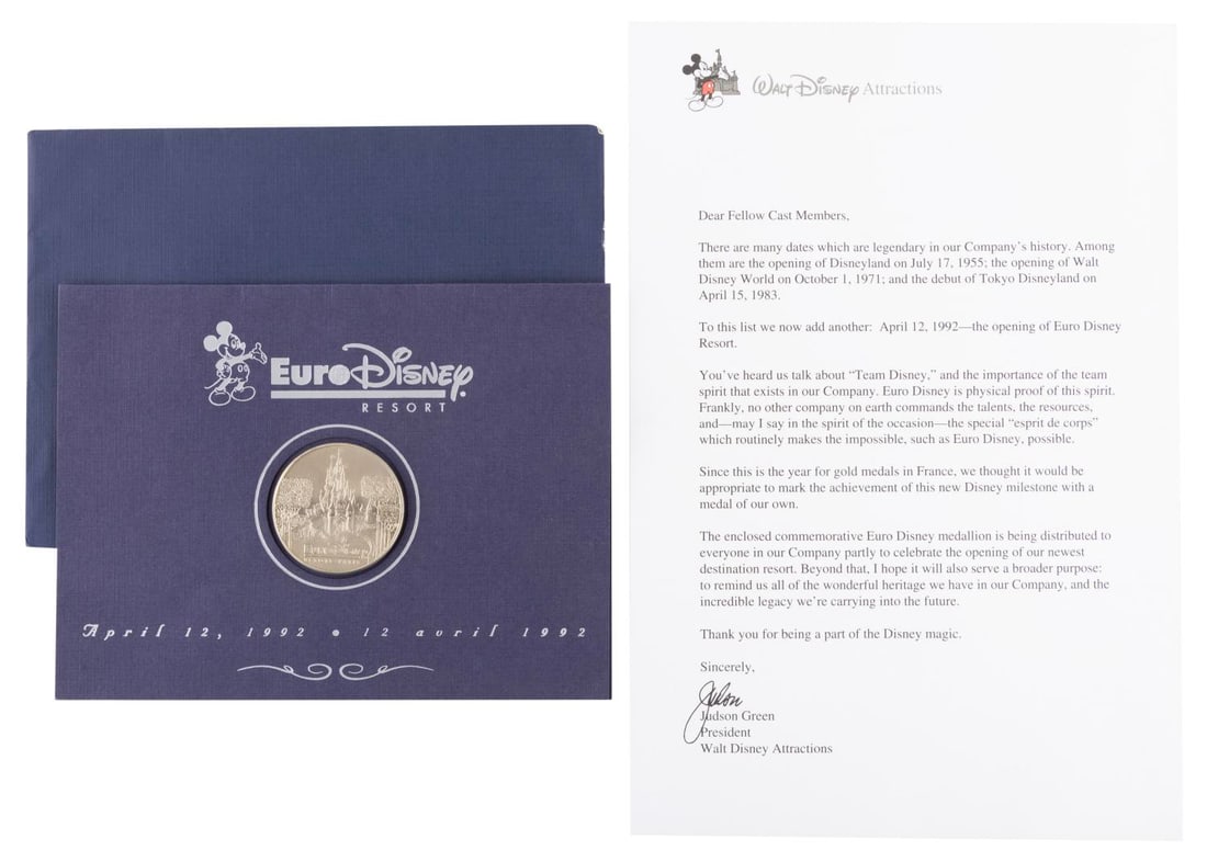 A Euro Disney Cast Member Grand Opening Coin and Letter. (1 of 2)