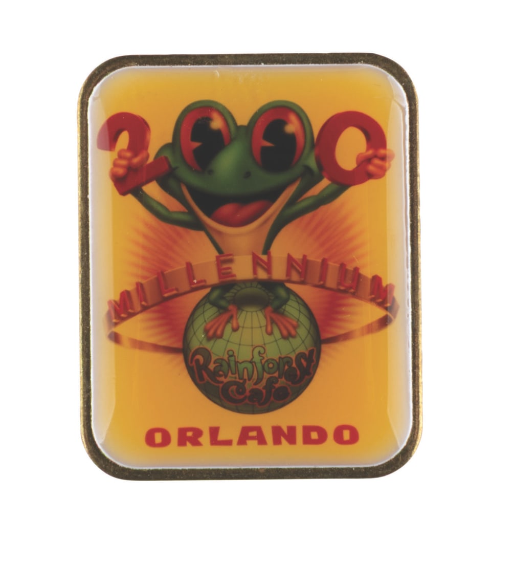 A "Rainforest Cafe Millennium" Pin. (1 of 1)