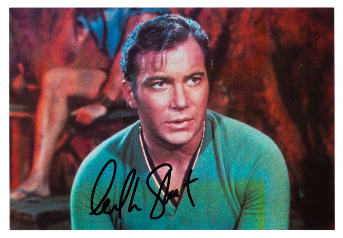 A William Shatner Signed Captain Kirk Postcard.: (Paramount, 1990s) A postcard of Captain Kirk from the original Star Trek series, signed by actor William Shatner. The 4" x 6" autographed postcard is in very good condition with light handling wear.