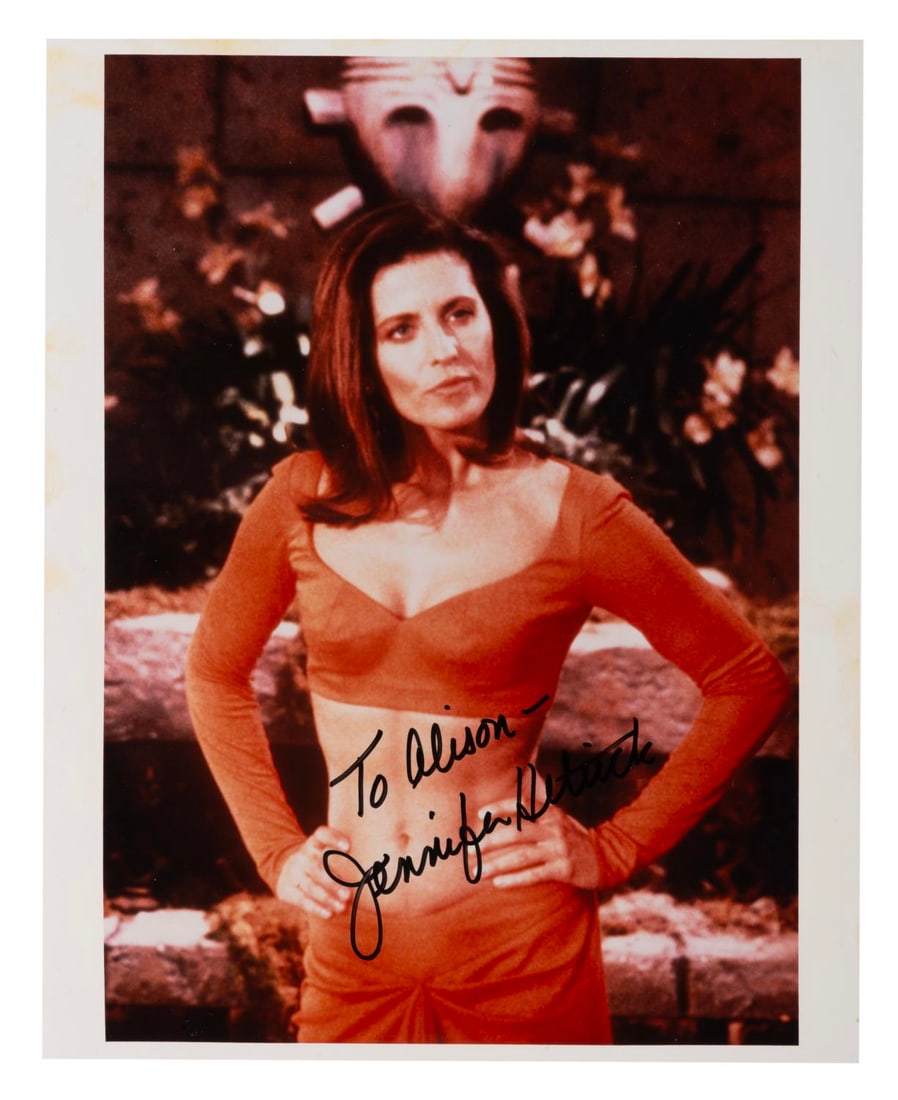 A "Star Trek: The Next Generation" Autographed Jennifer Hetrick Photo.: (Paramount, 1987) A signed photo of actress Jennifer Hetrick as Vash on "Star Trek: The Next Generation." Measuring 8" x 10", the photo signed with a dedication is in very good condition with slight d
