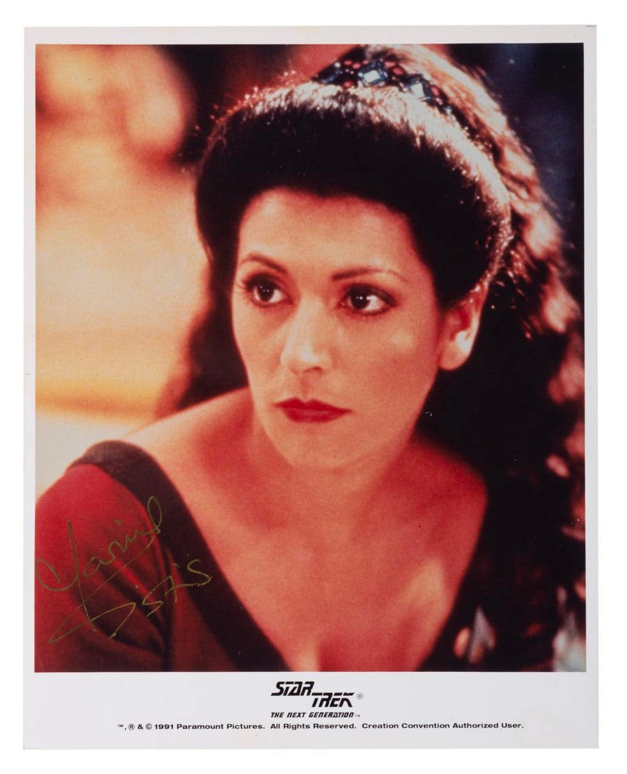 A Marina Sirtis Signed "Star Trek: The Next Generation" Photo.: (Paramount, 1991) An autographed photo of Marina Sirtis as Deanna Troi in "Star Trek: The Next Generation." Measuring 8" x 10", the signed photo is in fine condition.