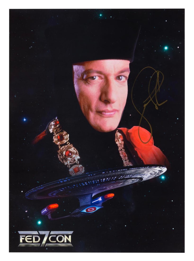 A John de Lancie as Q Signed Star Trek Photograph.: (Paramount/FedCon, 1999) An autographed photo of actor John de Lancie as Q in "Star Trek: The Next Generation." The print was produced for FedCon 7, Europe's largest science fiction convention, in 199