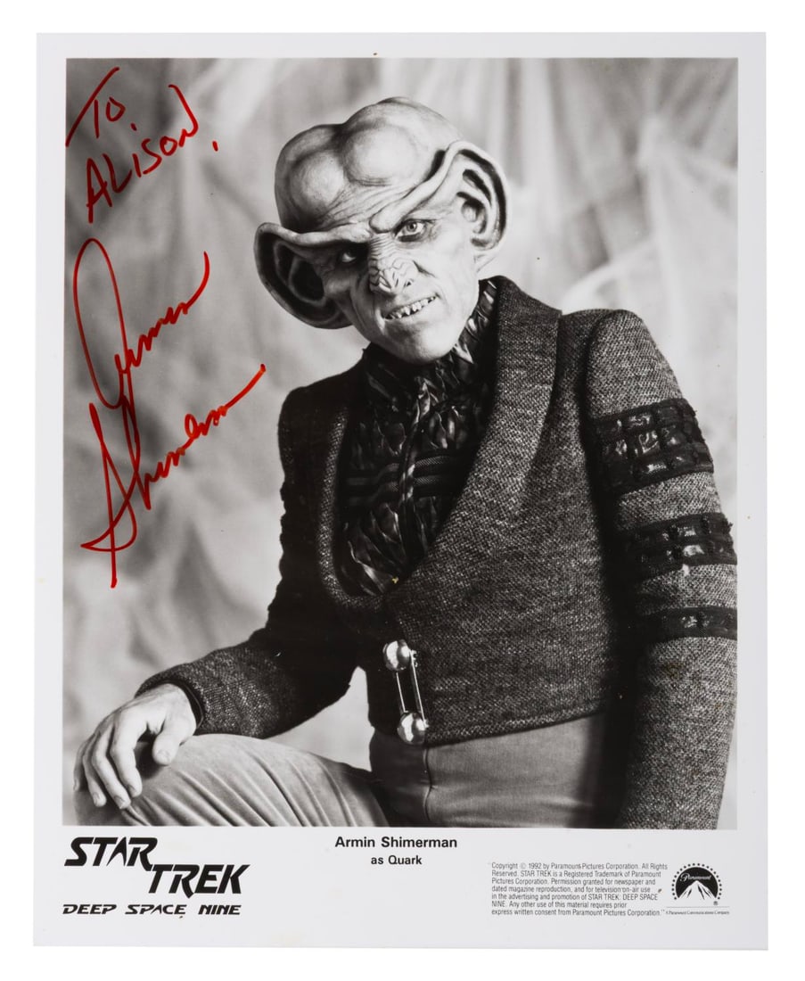 A "Star Trek: Deep Space Nine" Signed Quark Photo.: (Paramount, 1990s) An autographed photo of Armin Shimerman as the Ferengi Quark on "Star Trek: Deep Space Nine." Measuring 8" x 10", the photo signed with a dedication is in very good condition.