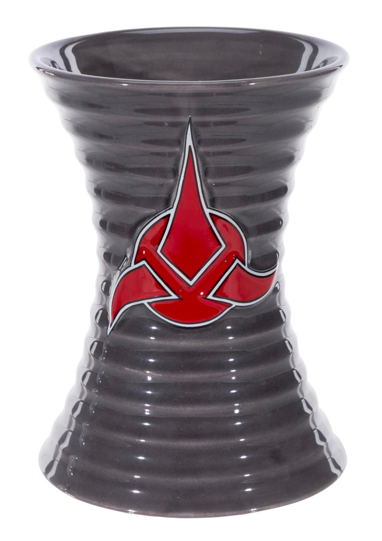 A Quark's Las Vegas Klingon Blood Wine Mug.: (Paramount, 2002) A ceramic Klingon blood wine mug, sold at Star Trek: The Experience & Quark's Bar and Restaurant in Las Vegas. Measuring 4.25" diameter x 6" tall, the mug is in fine condition. Tahja