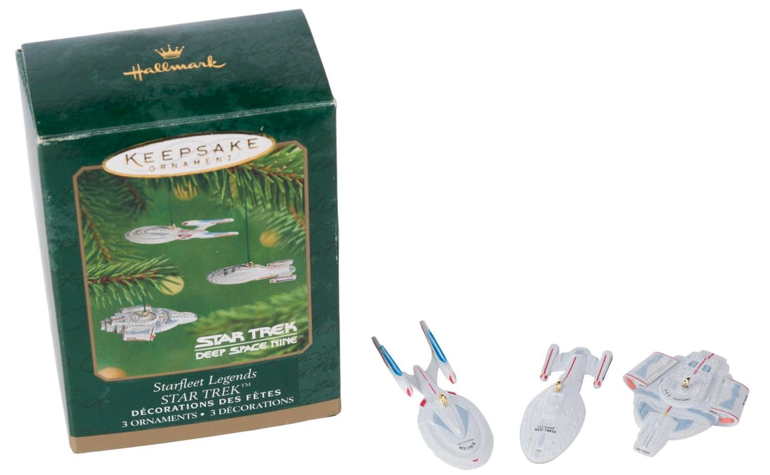 A Set of Star Trek Starfleet Legends Mini Ornaments.: (Hallmark, 2001) Three "Star Trek: Deep Space Nine" mini ornaments of the Enterprise NCC-1701-E, USS Defiant, and USS Voyager. Each measuring 1.75" long and under, the mini-ornaments are in fine condi