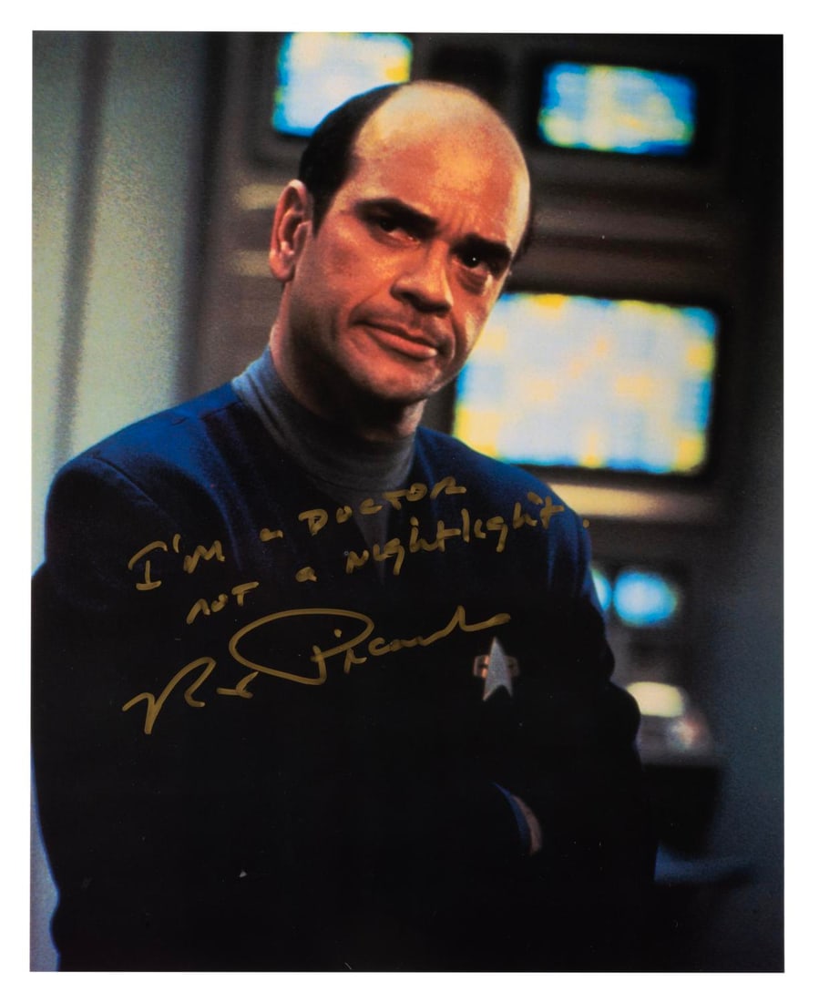 A Robert Picardo Signed "Star Trek: Voyager" Photograph.: (Paramount, 1990s) An autographed photo/oversized postcard of Robert Picardo as the Doctor on "Star Trek: Voyager." Measuring 8" x 10", the photo is in fine condition.