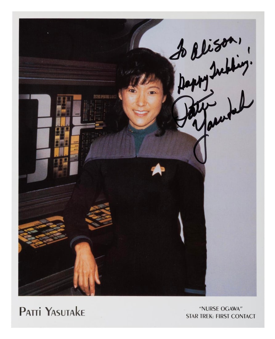 A "Star Trek: First Contact" Nurse Ogawa Signed Photo.: (Paramount, 1996) A signed photograph of actress Patti Yasutake as Nurse Ogawa in "Star Trek: First Contact." Measuring 8" x 10", the photo autographed with a dedication, is in fine condition.