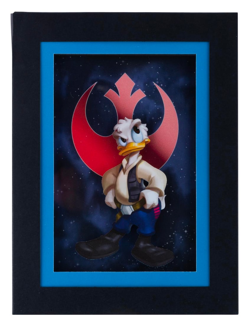 A Donald Duck Star Wars Laser Cel.: (Disney, 2000s) A limited edition Laser Cel of Donald Duck as Han Solo. Measuring 6" x 8" overall, the piece is in fine condition sealed in the original sleeve.