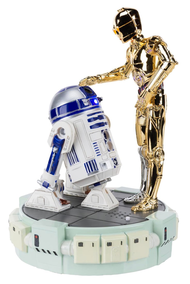 A Star Wars Limited Edition C-3PO and R2-D2 Figurine.: (Disney Store, 2015) A figurine of C-3PO and R2-D2 from Star Wars, released in a limited edition of 500 by the Disney Store. The light and sound functions worked when tested, requiring 3 AA batteries 