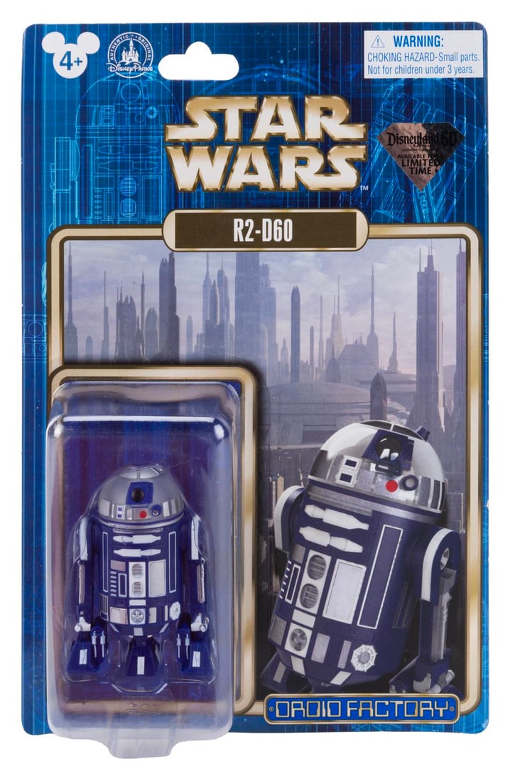 A Star Wars Disneyland 60th R2-D60 Limited Edition Action Figure.: (Disneyland Resort, 2015) An R2-D60 droid Star Wars action figure, released in May 2015 exclusively at Disneyland Resort to celebrate the Park's 60th anniversary. The toy is in fine condition, sealed 