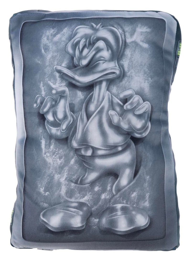 A Star Wars Donald Duck in Carbonite Pillow.: (Disney Parks, 2000s) A Donald Duck in Carbonite Star Wars pillow exclusively available at the Disney Parks. Measuring 6.5" x 12" x 18" the pillow is in fine condition.