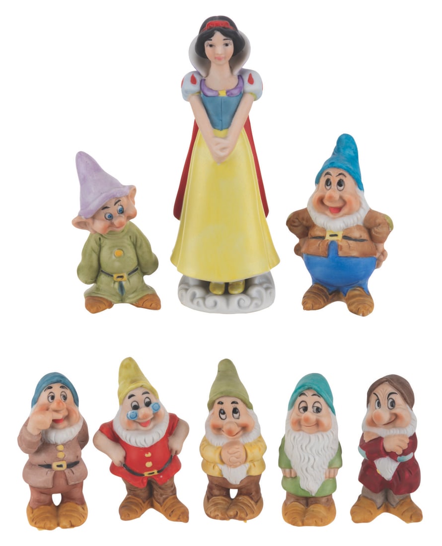 A Set of "Snow White and the Seven Dwarfs" Figurines. (1 of 4)