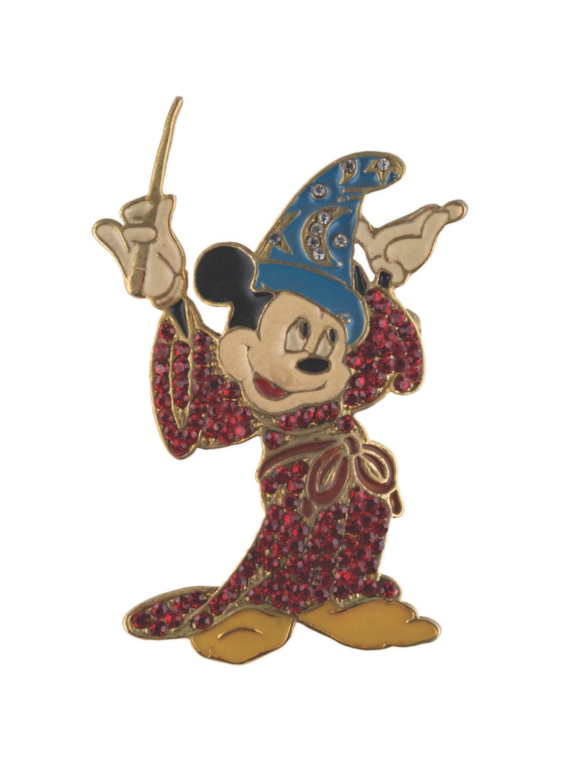 A "Fantasia" Sorcerer Mickey Mouse Brooch.: (Disney, 1980s-90s) A "Fantasia" brooch of Sorcerer Mickey. Measuring 2.5", the brooch is in good condition with wear and color shift from age.