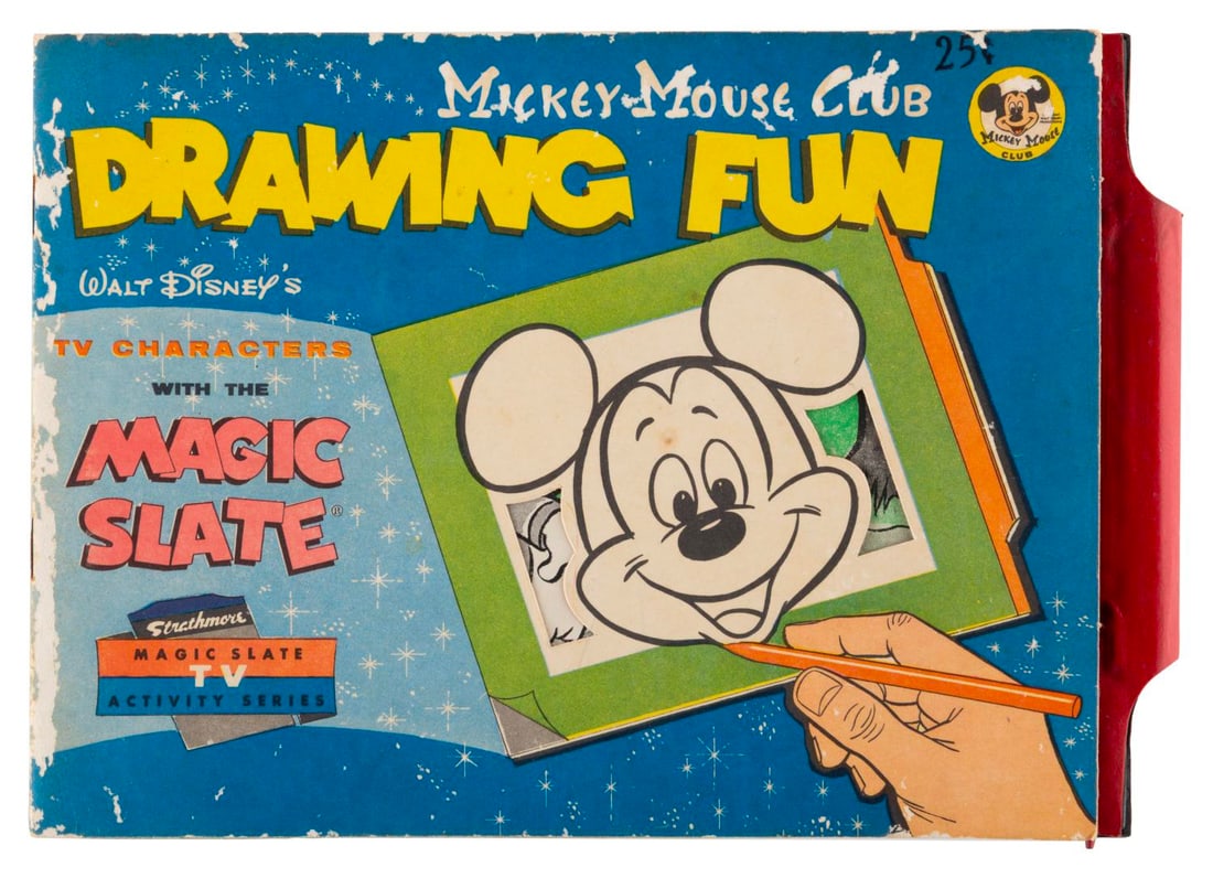 A Mickey Mouse Club Drawing Fun Magic Slate.: (Strathmore, 1954) A Mickey Mouse Club Magic Slate toy with traceable imagery of Mickey, Donald, and friends. Measuring 6.5" x 9", the toy is in good condition, with the stylus included, spots of pape