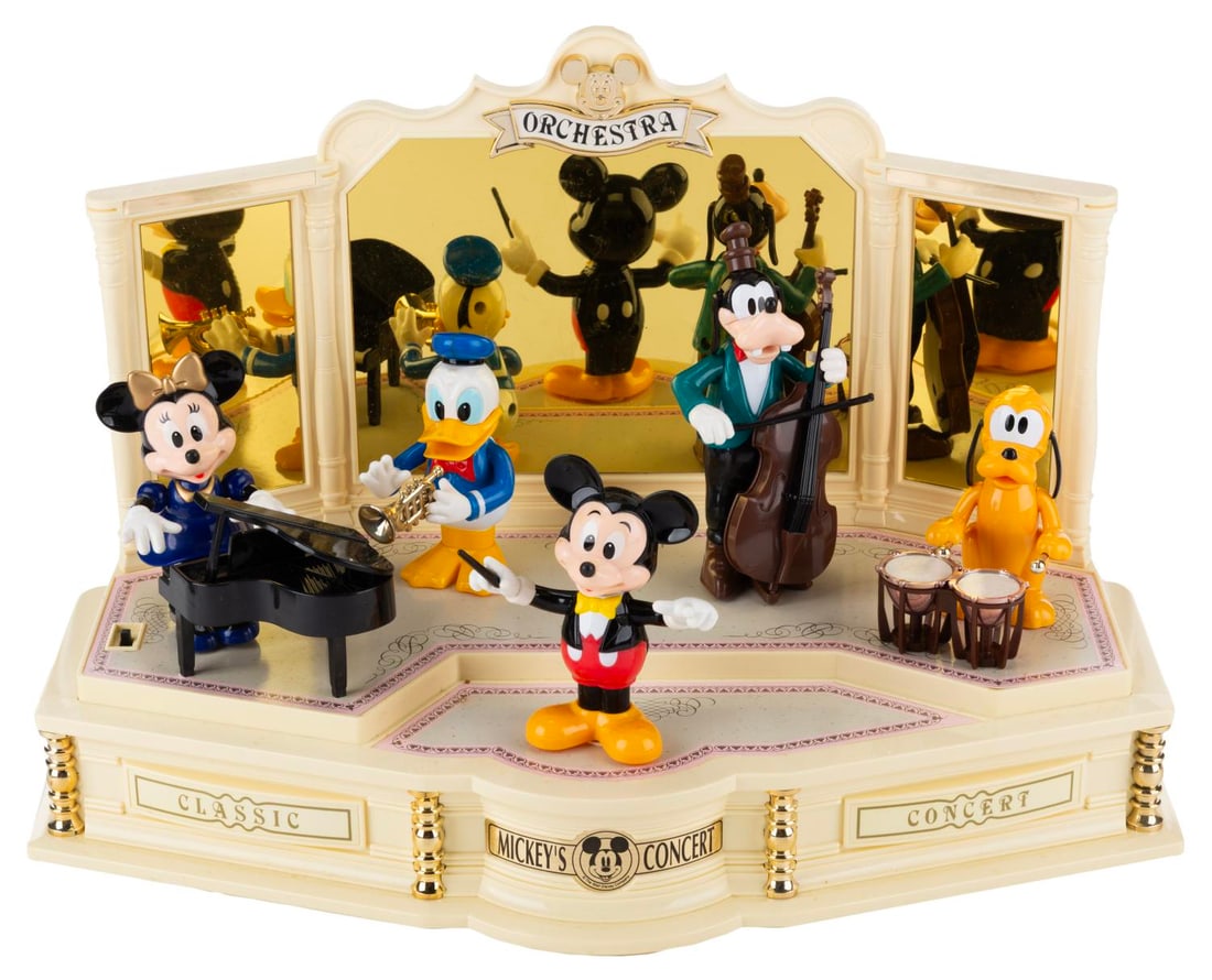 A Mickey's Concert Play-Along Show by Takara.: (Takara, 1980s-90s) A Mickey's Concert Sound-Activated Play-Along Show toy, featuring the Fab Five playing instruments while Mickey conducts. The figures are sound-activated to move and play,