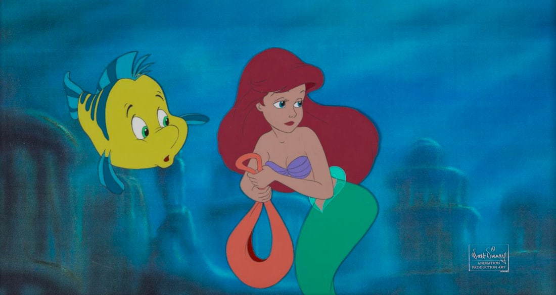 A "The Little Mermaid" Original Production Cel.: (Disney, 1989) A framed original hand-painted production cel of Ariel and Flounder from "The Little Mermaid." Ariel and Flounder have an image size of 6.5" x 8.5" on a 8" x 15" visible cel. The
