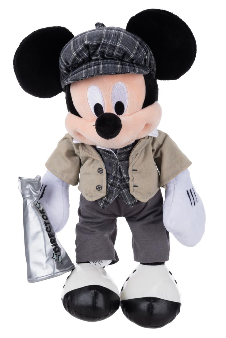A Disney Parks Director Mickey Plush.: (Disney, 2000s) A plush of Mickey Mouse dressed as an old-school Hollywood director, complete with a megaphone. Measuring 18" tall, the plush is in very good condition with spots of discoloration on t