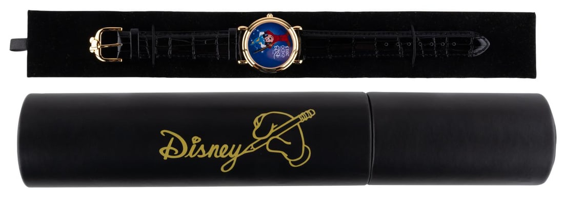 A Limited Edition D23 Mickey Mouse Wristwatch.: (D23, 2013) A limited edition Sorcerer Mickey wristwatch and leatherette case from the 2013 D23 EXPO. Numbered 33/150, the watch is being sold as untested and may require a new battery or service to f