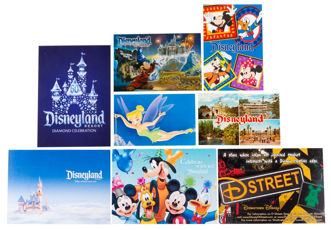 A Collection of 1960s-2015 Disneyland Postcards.: (Disneyland, 1960s-2015) Eight postcards from throughout Disneyland's history ranging from views of New Tomorrowland in the late 1960s, to Downtown Disney and the 60th anniversary. The postcards are i