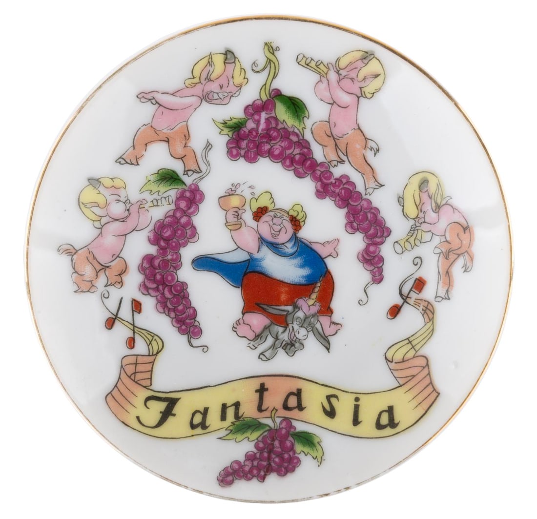 A "Fantasia" Disneyland Souvenir Plate.: (Disneyland, 1950s) A Disneyland souvenir plate featuring Bacchus from "Fantasia." Measuring 4" in diameter, the plate is in very good condition with light wear.