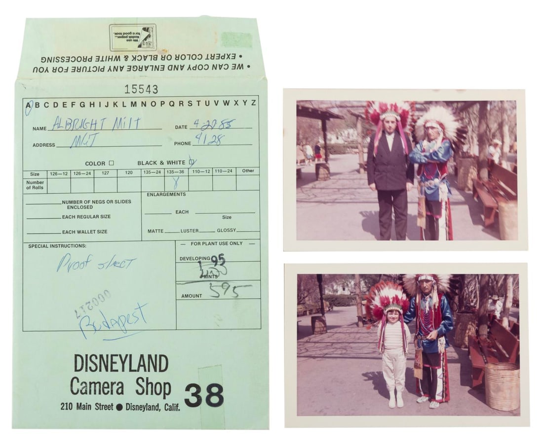 A Disneyland Camera Shop Envelope & Indian Village Photos.: (Disneyland, 1985) Two photos of Disneyland Guests with Indian Village Cast Members, along with an order envelope from the Disneyland Camera Shop. These came from the estate of Disney Legend Milt Albr
