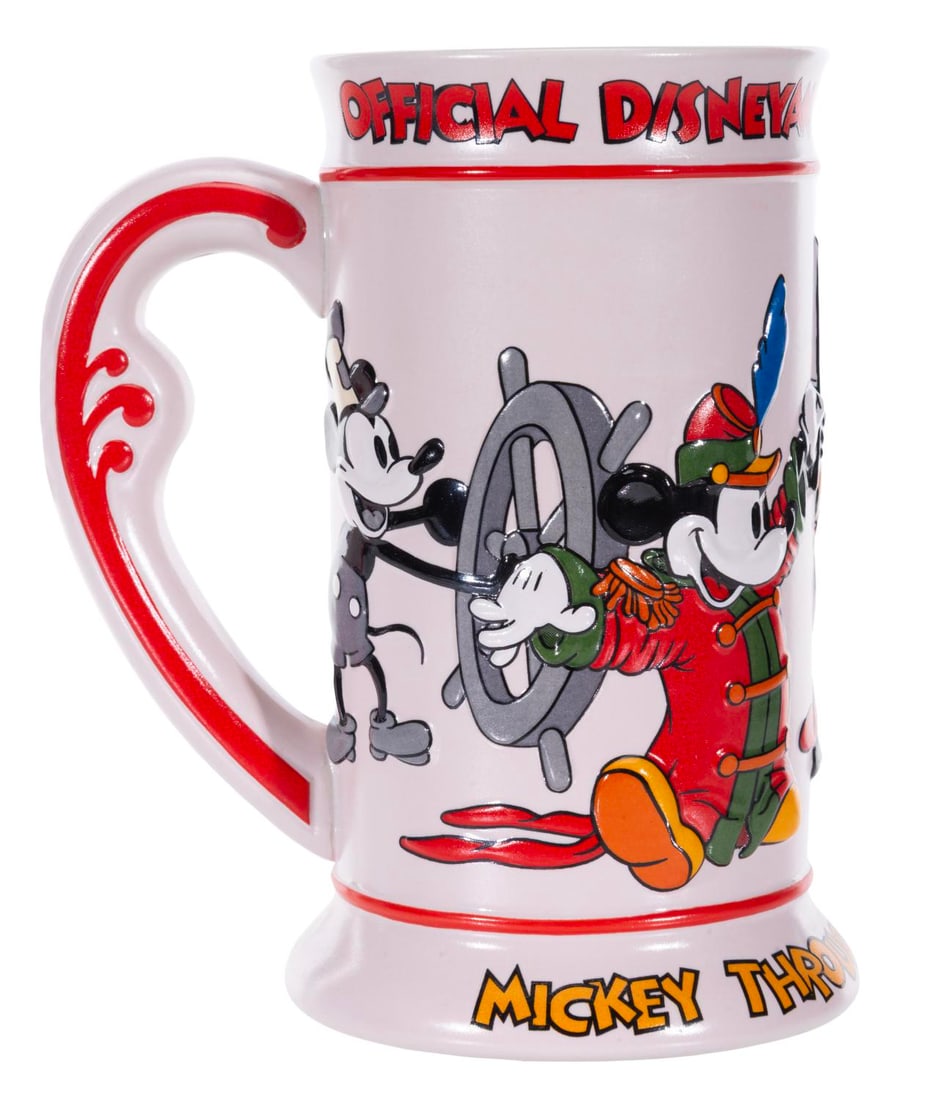 A Disneyana Convention Mickey Through the Years Stein.: (Disneyland, 1993) A relief stein of Mickey through the years, released in a limited edition of 3,000 at the 2nd Disneyana Convention. Measuring 6.75" tall and 3" in diameter, the stein is in very goo