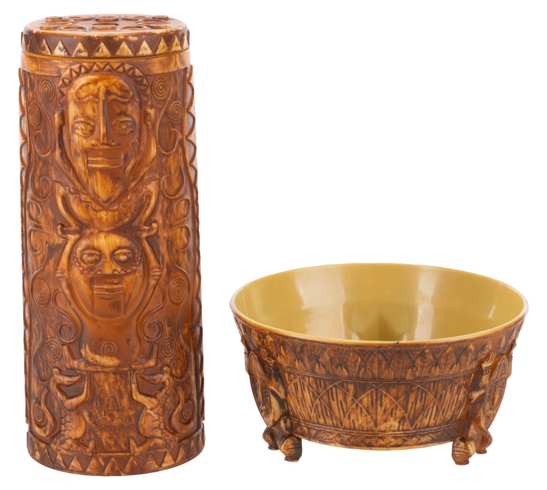 A Disney Parks Tiki Bowl and Sipper Set.: (Disney Parks, 2010s-20s) A souvenir plastic tiki bowl and sipper, based on Walt Disney's Enchanted Tiki Room. Ranging in size from 4.75" in diameter and 2.5" tall to 2.75" in diameter and 7" tall,