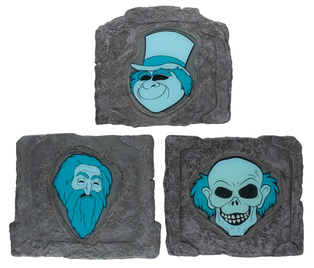 A Rare Set of Hitchhiking Ghosts Stepping Stones.: (Disneyland, 2007) A rare set of three Hitchhiking Ghost stepping stones featuring Ezra, Phineas, and Gus from the Haunted Mansion. Measuring 11" x 13" each, the heavy resin stones display in good to