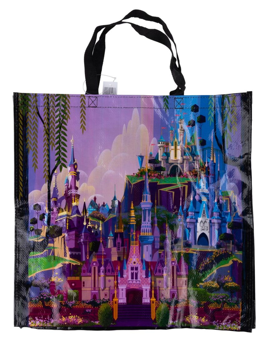 A Disney Parks Haunted Mansion Reusable Bag: (Disney Parks, 2010s) A reusable tote bag featuring Disney Parks Castles and Haunted Mansions, with designs by Jacques Dupuis. The 19" x 20" tote is in fine condition.