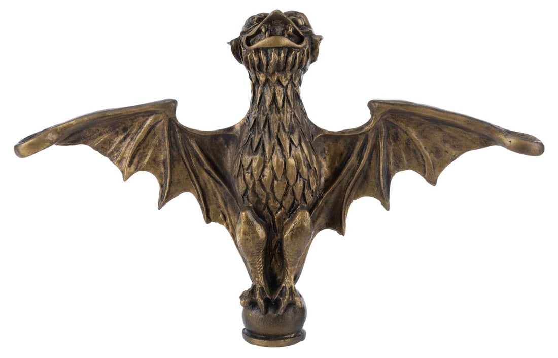A Haunted Mansion Bat Stanchion Replica.: (2010s-20s) A lifesized replica Haunted Mansion bat stanchion prop. Likely a fan-made prop, the replica is accomplished in cast resin. Measuring 2.5" x 12" x 19" the stanchion is in very good conditio