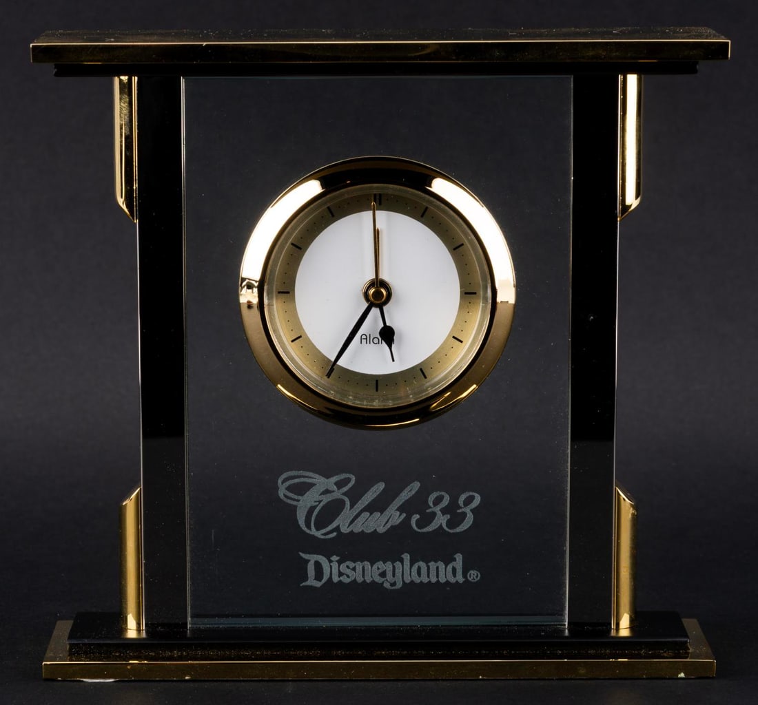 A Club 33 Desk Clock.: (Disneyland, 2000s) A Club 33 desk clock, exclusively available at the members-only restaurant in New Orleans Square. The clock did not work when tested, likely requiring service or a new battery to f