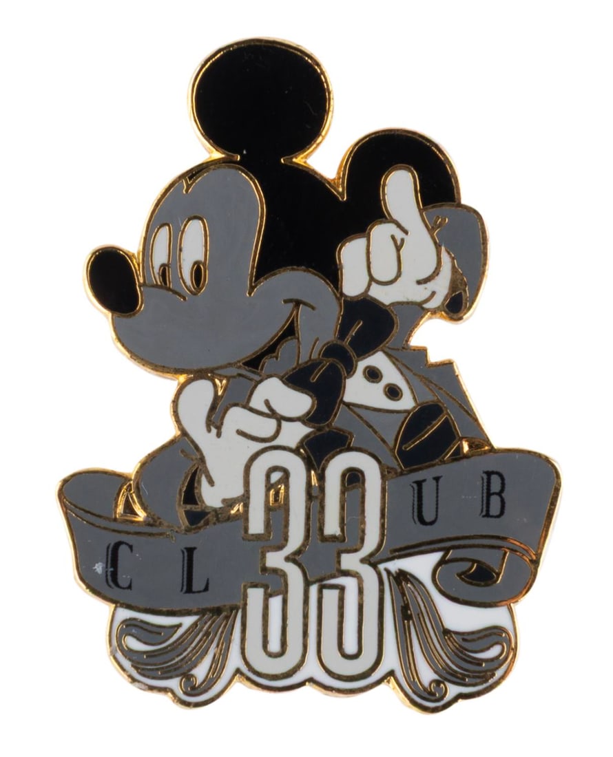 A Mickey Mouse Club 33 Pin.: (Disneyland, 2002) A monotone pin of Mickey Mouse, released only at New Orleans Square's exclusive Club 33 in a limited edition of 3333. The pin is in fine condition.