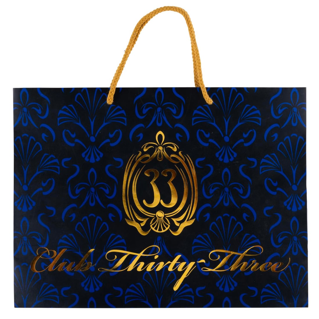 A Large Patterned Club 33 Shopping Bag.: (Disneyland, 2010s-20s) A large Club 33 shopping bag featuring the updated logo printed in shiny gold lettering on both sides. Measuring 6" x 12" x 16", the bag is in good condition with creasing, scu