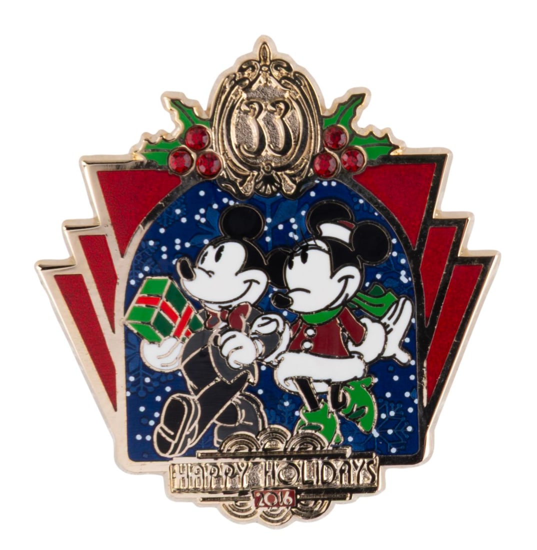 A Club 33 Happy Holidays 2016 Pin.: (Disneyland, 2016) A Happy Holidays 2016 pin of Mickey and Minnie, released exclusively at Disneyland's Club 33 in a limited edition of 1000. The pin is in fine condition.