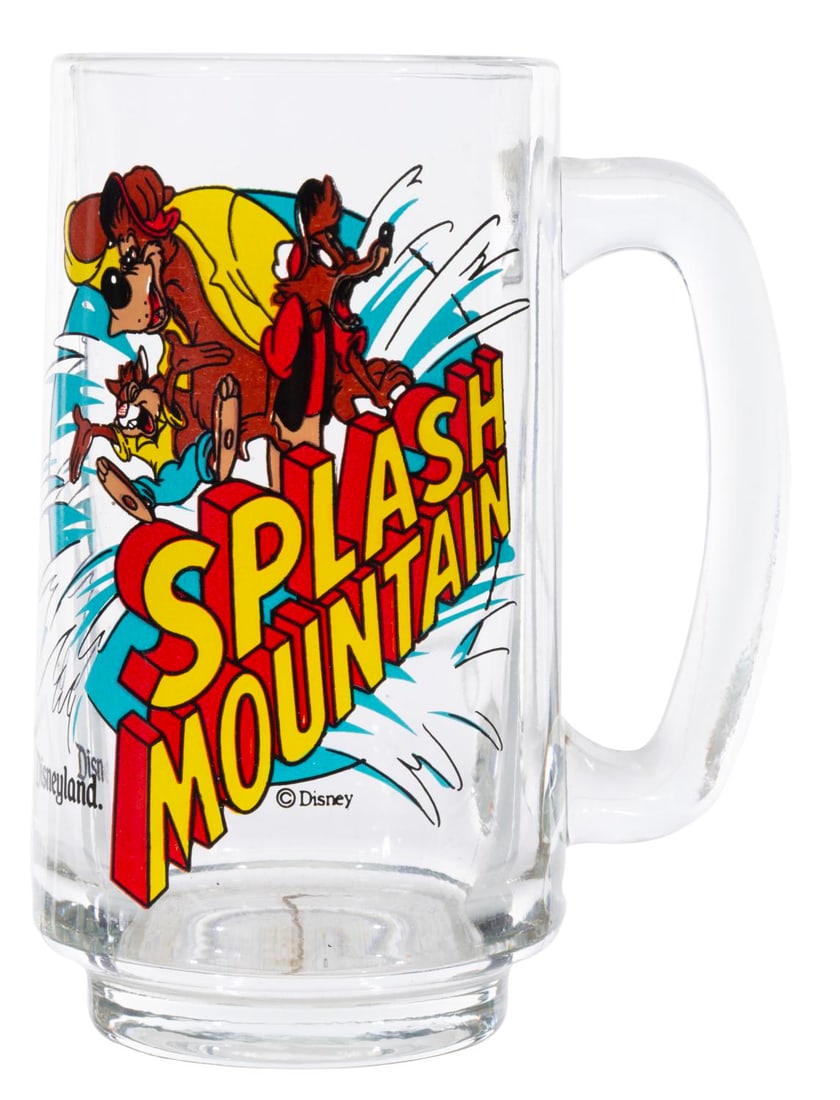 A Disneyland Splash Mountain Mug.: (Disneyland, 1980s) A souvenir glass Splash Mountain mug from Disneyland featuring Br'er Rabbit, Br'er Fox, and Br'er Bear. Measuring 5.5" tall and 3" in diameter, the glass mug displays in very good