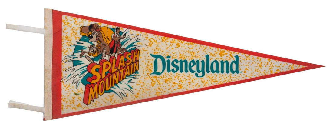 A Disneyland Splash Mountain Pennant.: (Disneyland, 1989) A rare souvenir Splash Mountain pennant from Disneyland featuring Br'er Rabbit, Fox, and Bear. Measuring 11.75" x 34", the pennant is in good condition with some spotting along the