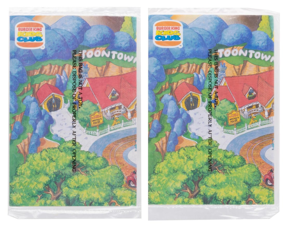 A Pair of "Mickey's Toontown" Burger King Kids Club Maps.: (Burger King, 1993) A pair of sealed Mickey's Toontown maps, part of a promotion with the Burger King Kids Club. Measuring 6" x 9.25" folded, the unopened maps are in presumed fine condition.