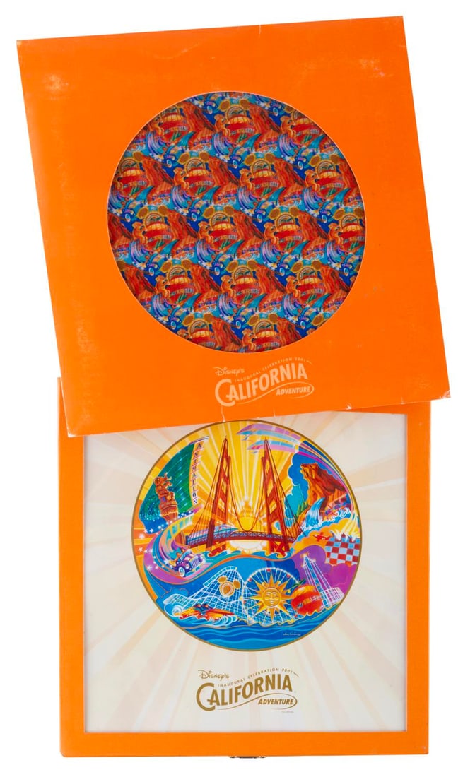 A Disney's California Adventure Inaugural Celebration Plate and Scarf.: (Disney's California Adventure, 2001) A plate and scarf from the Grand Opening Inaugural Celebration of Disney's California Adventure. The scarf measures 10" x 10" folded in its original packaging