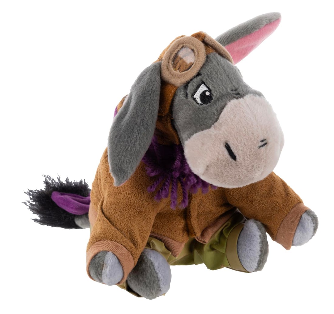 A Soarin' Over California Eeyore Plush.: (Disney's California Adventure, 2001) A Disney's California Adventure exclusive Soarin' Over California Eeyore bean bag plush. Standing 5.5" tall the plush is in very good condition with slight discol